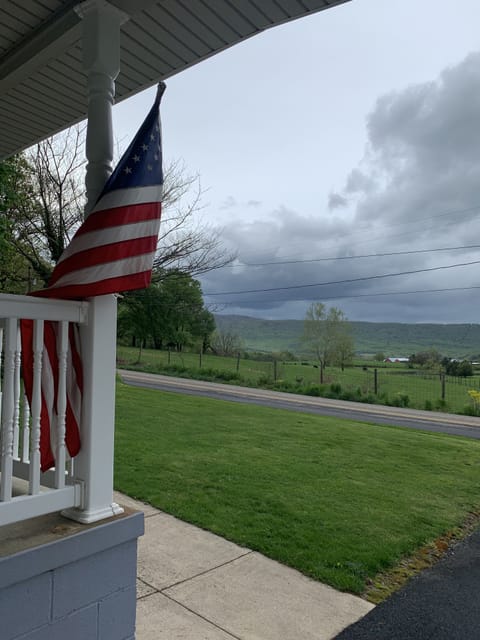 Watching the storm clouds from the carport.