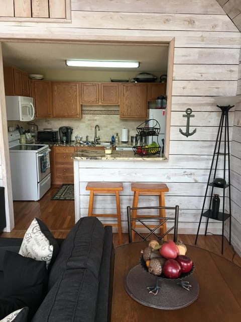 Drop-leaf table in great room seats 4 for quick breakfast or snack & bar seats 2