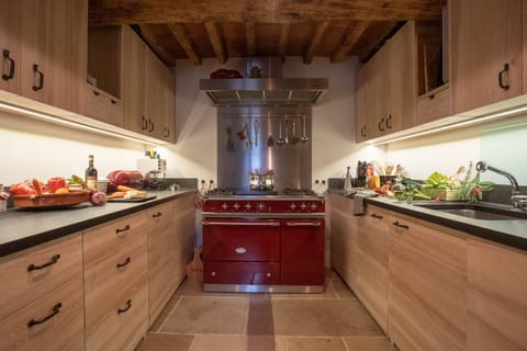 Cook, connect and celebrate in your private  restaurant kitchen on ground floor