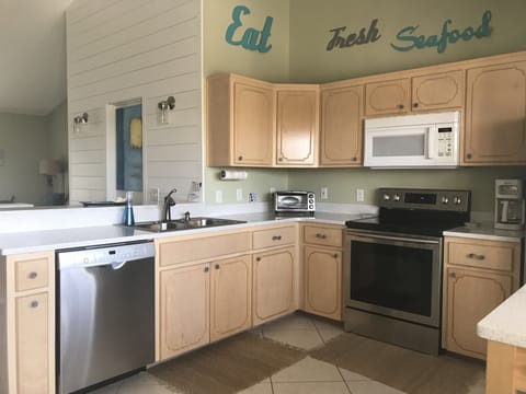 Large kitchen w/ new appliances + a pantry w/ plenty of room to store supplies