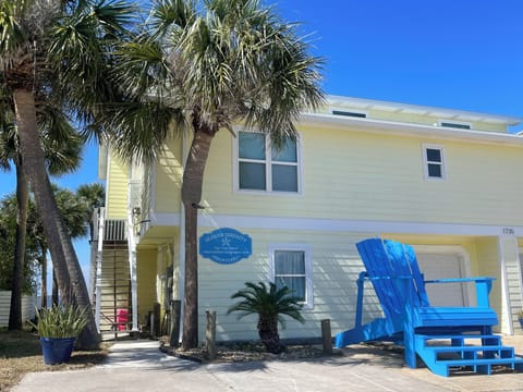 Front of home & side entrance, with fun, oversized chair-great for family pics.