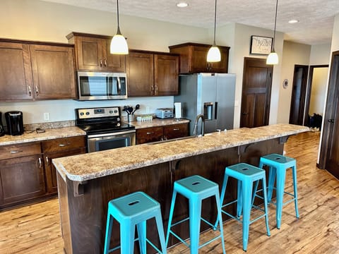 Brand new dishwasher, oven and range, refrigerator with ice and water, coffee...