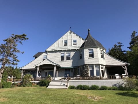 Front view of the house and wrap around deck