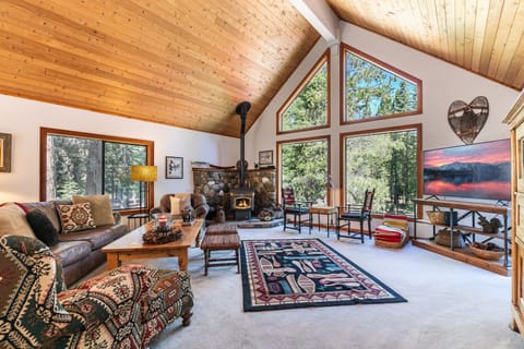Light, bright great room for family gathering.  Private forest views.  