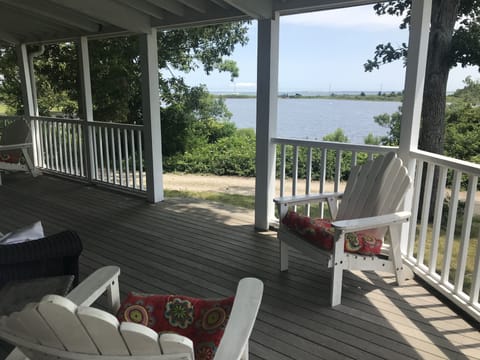 The huge wraparound porch overlooks Farm Pond and Nantucket Sound. 