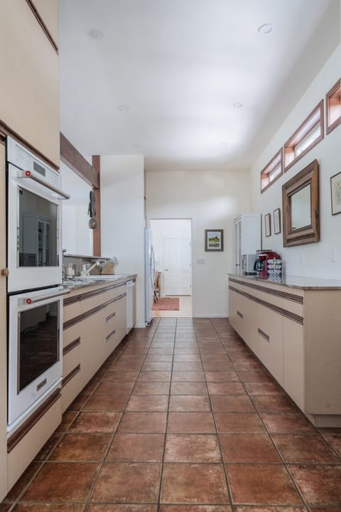 kitchen with newer double oven, fridge & dishwasher