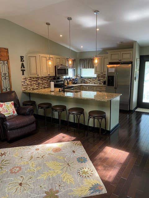 Standing in keeping room. Seating for 5 at barstool counter.