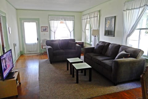 View of the living room from the dining area.  The Great Room is large and airy.