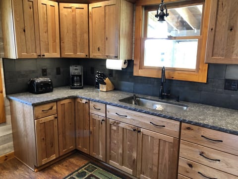 Kitchen: Remodeled with new quartz countertops, cabinets, ect...