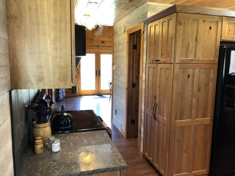Kitchen: looking down hallway into great room / living room