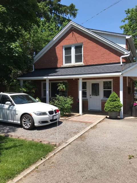 The covered front porch will provide a relaxing place to sit outside if it rains