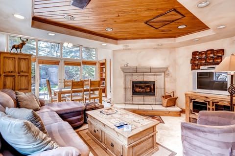 Living Room view toward Dining area and private patio