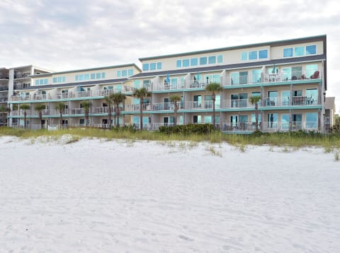 Beach view looking in of Nautical Watch, a nice low-rise community