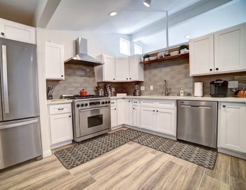 6 burner stove and pots/pans, dishes and silverware provided