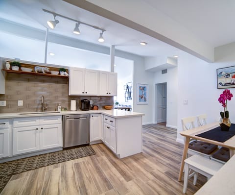 Kitchen is stocked with appliances and utensils