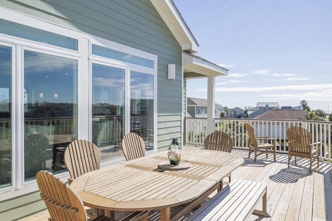 SECOND FLOOR DECK WITH VIEW OF THE GULF, NOW HAS A PARTIAL SHADED LOUVERED COVER