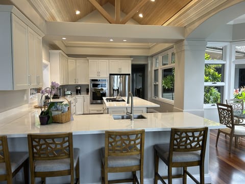 Kitchen has an island and peninsula