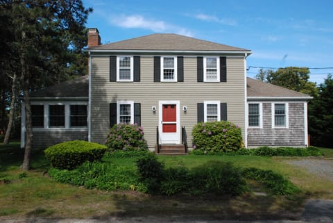 Front of house showing enclosed porch (L), 