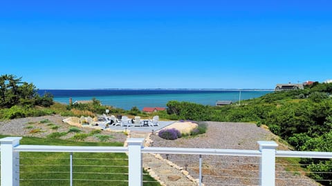 View from upper deck with access from exterior and second floor primary bedroom