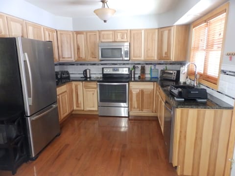 Kitchen is  well equipped to prepare big family meals, or  to grab a quick bite.