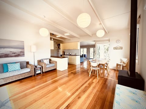 Kitchen, dining and first living area, looking through to main living area