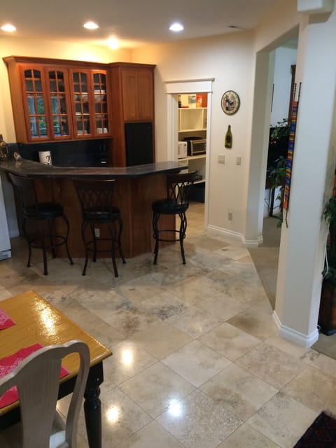 Spacious travertine stone area makes a great dance floor.