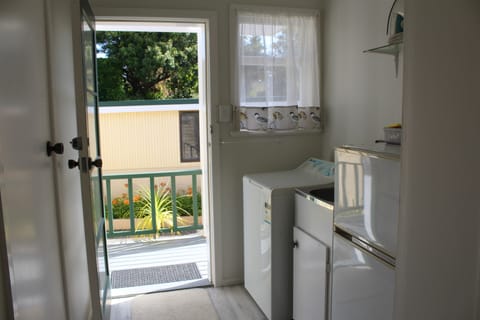 Laundry with spare fridge/freezer
