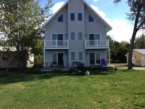 Back view of three story Lakehouse