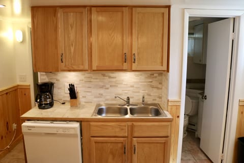 New glass & marble backsplash, wainscoting on walls and new full size dishwasher