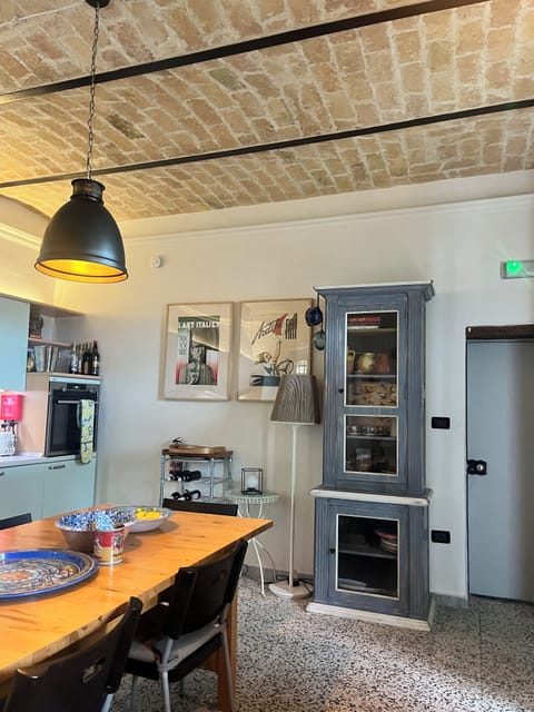 Kitchen with exposed vaulted ceiling