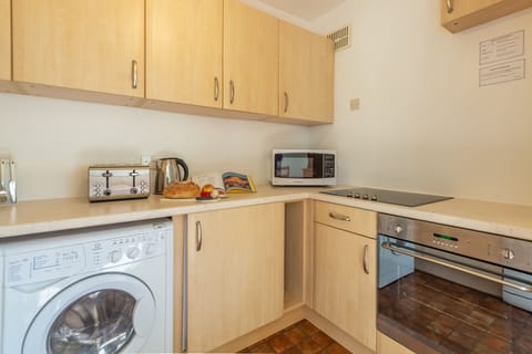 12 Westward Flats, Polzeath. First floor: Kitchen