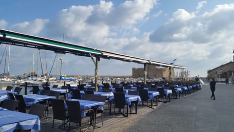 Paphos Harbour with it's numerous restaurants and the historic fort