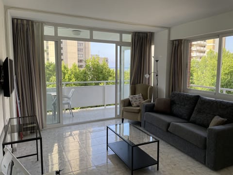 Light and airy lounge with balcony off