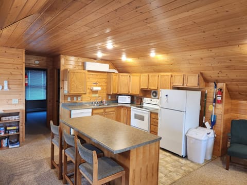 Full size kitchen with bar