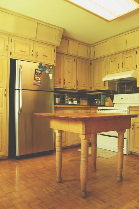 Bright and complete kitchen overlooking the river.