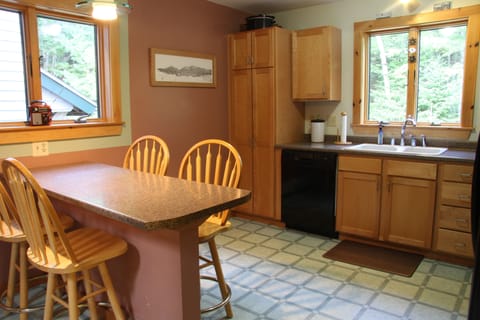 The kitchen is fully applianced and functional.