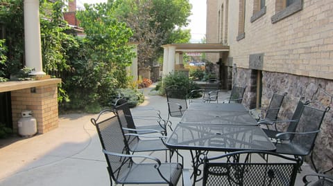 The communal patio seats comfortably ten people.