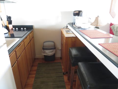 Bar stools in kitchen allow for eating at counter and enjoying the view