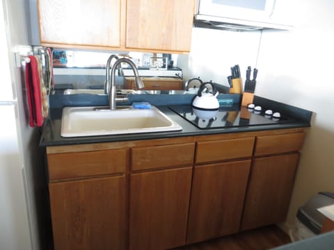 There is a cook top and microwave/convection oven combo