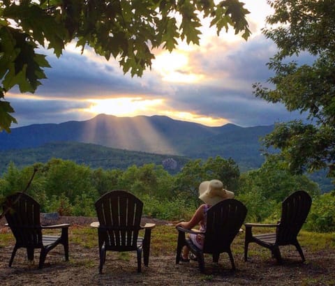 Watch the sunset in an adirondack and enjoy the show!