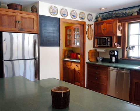 Kitchen with new Stainless Steel appliances, and beautiful wood cabinets
