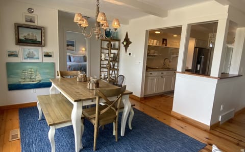 Dining, kitchen with view of master bedroom.