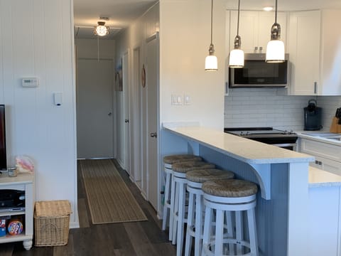 Hallway to bathrooms & bedrooms