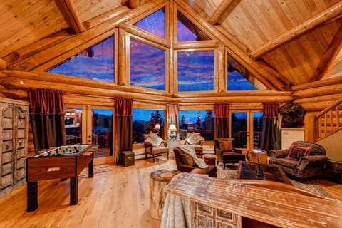 Huge 2 story Lvg room w/floor to ceiling windows, fireplace & amazing views! 