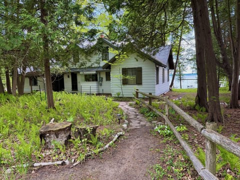 Approach to the cottage with view of lake