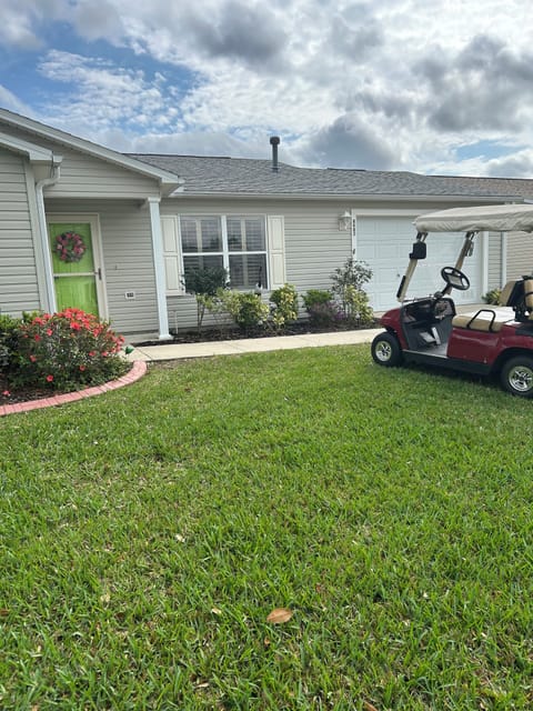 House with Cart on corner lot
