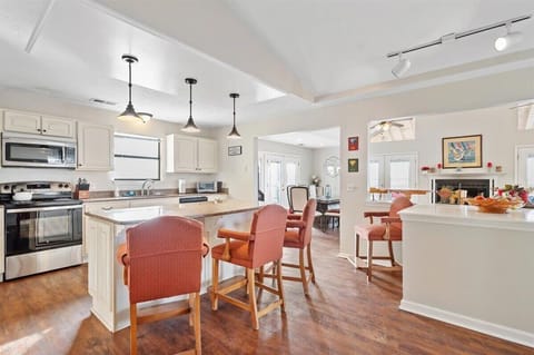Kitchen seating area with granite counter tops.