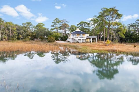 View of the house, and backyard at high tide.