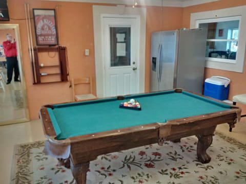 Pool table for family recreation.