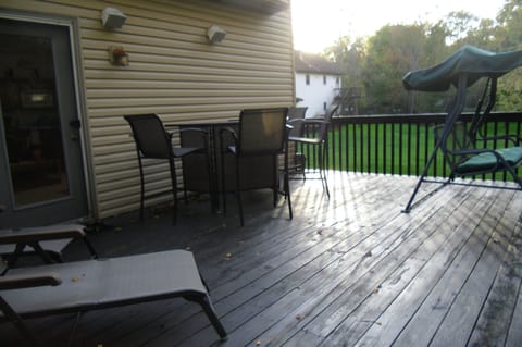 Balcony overlooking 3 acres of Grounds including creek, small lake & and trees